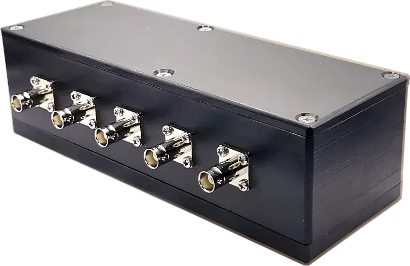 Black aluminium enclosure with five BNC connectors