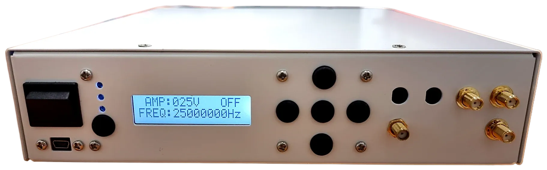 The ultrasonic pulser box from the front, with its display, controls and RF connectors